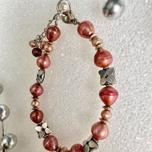 Handmade Pearl & Silver Bracelet w/lobster claw clasp. Peach & Coral colors.